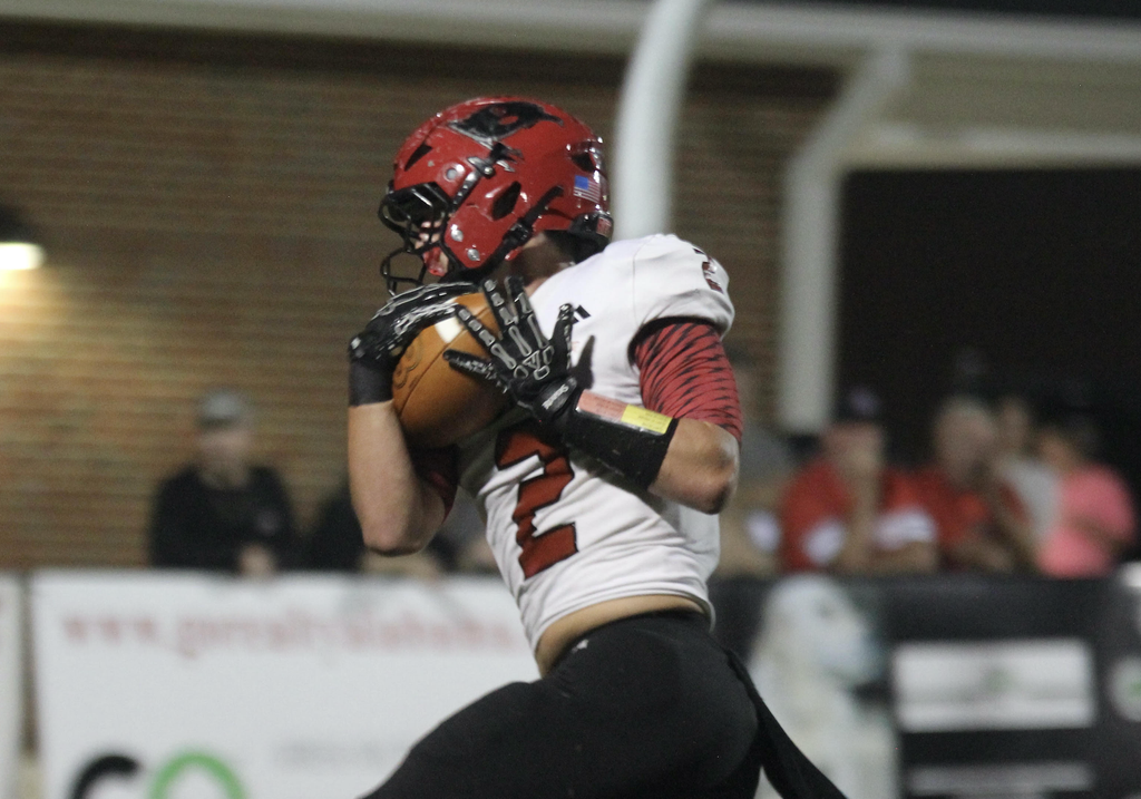 THURSDAY NIGHT LIGHTS: Fyffe runs over Sand Rock